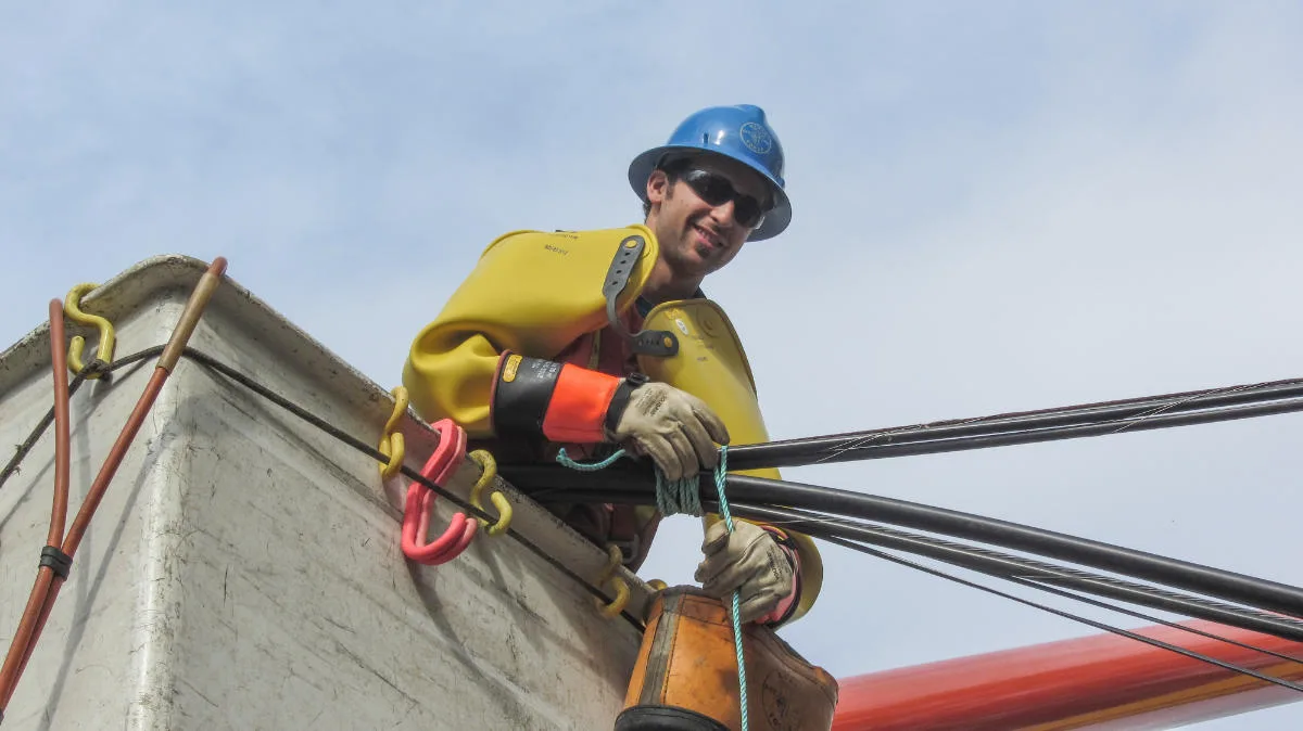 Power Line Installation – Smiling Metro Power Worker